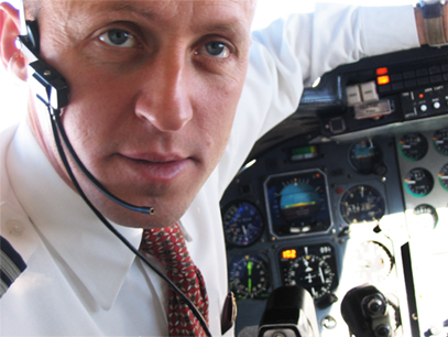 James Berisha behind the controls of a Learjet which he flies for Sierra West Airlines - jamespilot